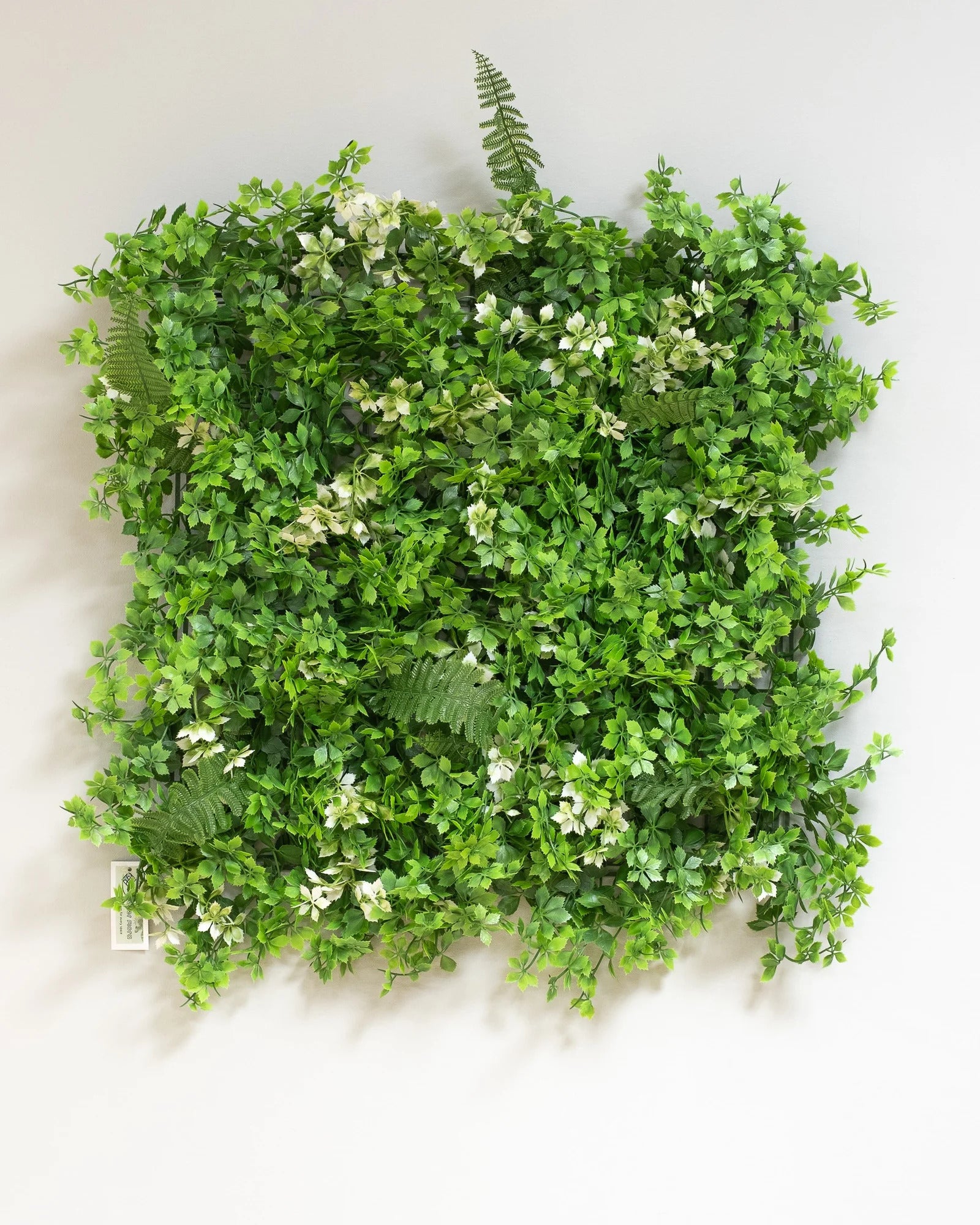 Närbild på detaljerna i Konstgjord växtvägg Växtblomm – 50 × 50 cm UV