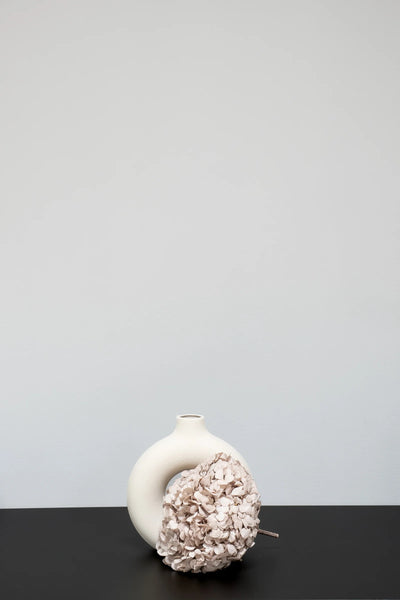 Detaljbild av Premium Hortensia som konserverad blomma i kaffe