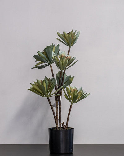 Närbild på detaljerna i Konstgjord lotus krukväxt i ljusgrön melaminkruka – 55 cm